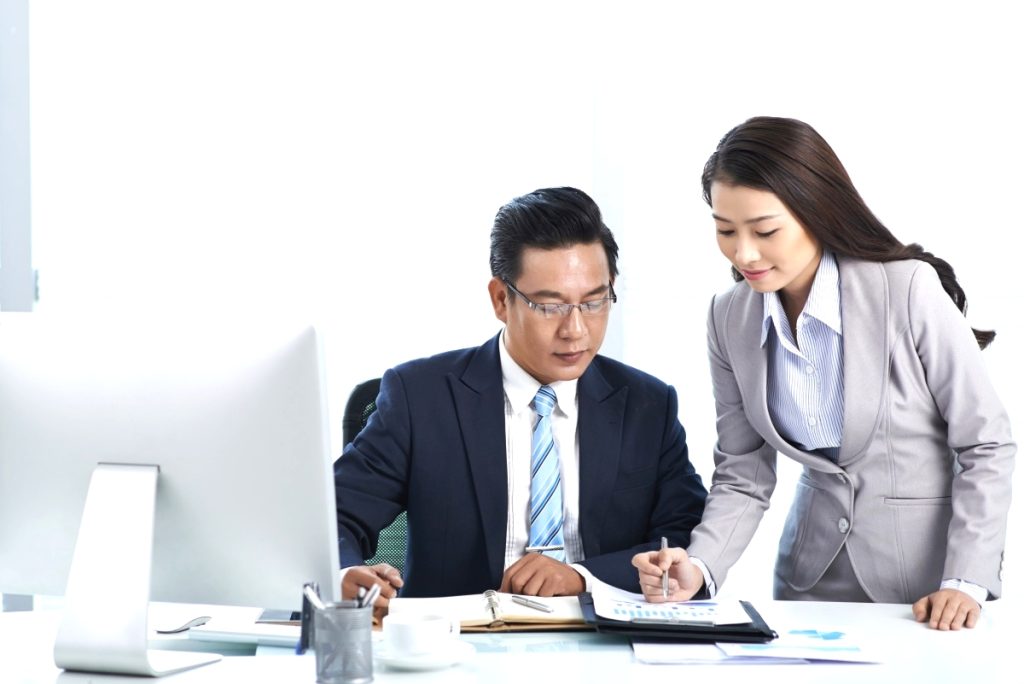 woman pointing to data